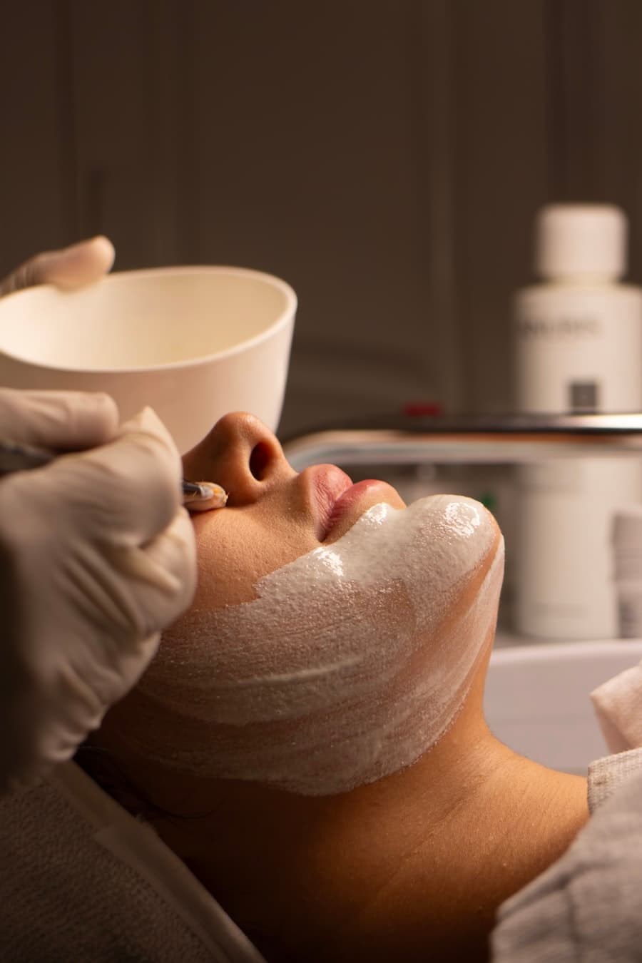 A person receiving a facial treatment